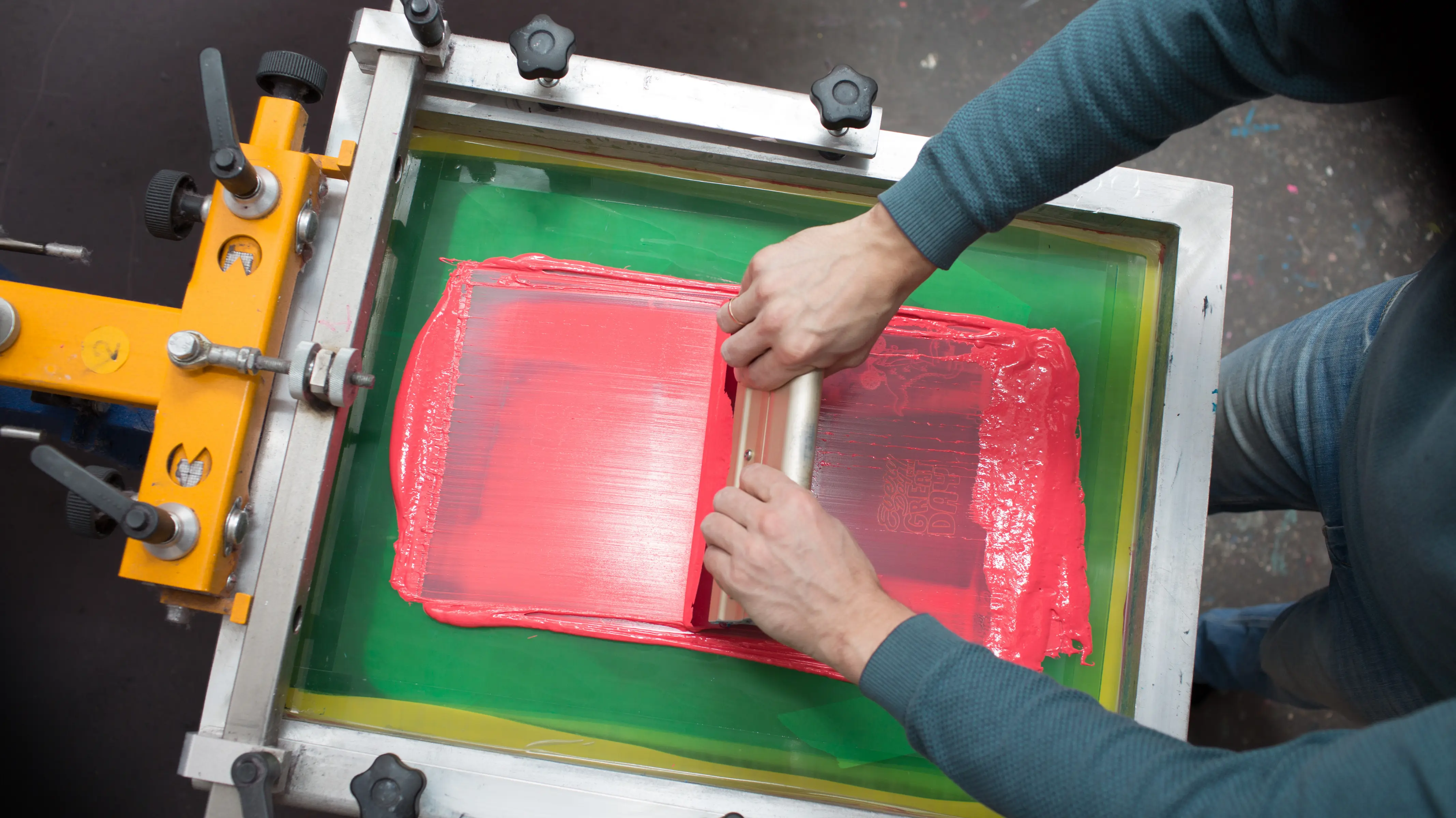 Custom t-shirt screen printing with pink ink - Styledev.in garment printing services